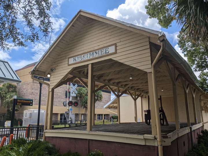 A raised wooden freight platform, covered by a canopy