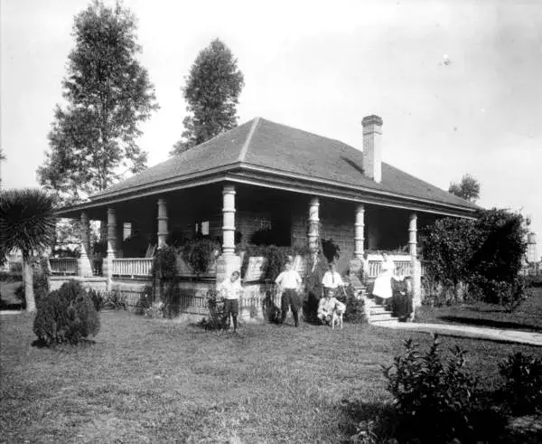 a black and white photo of the house in the first photo