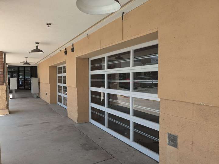 Faux garage doors on the outside of the grocery store