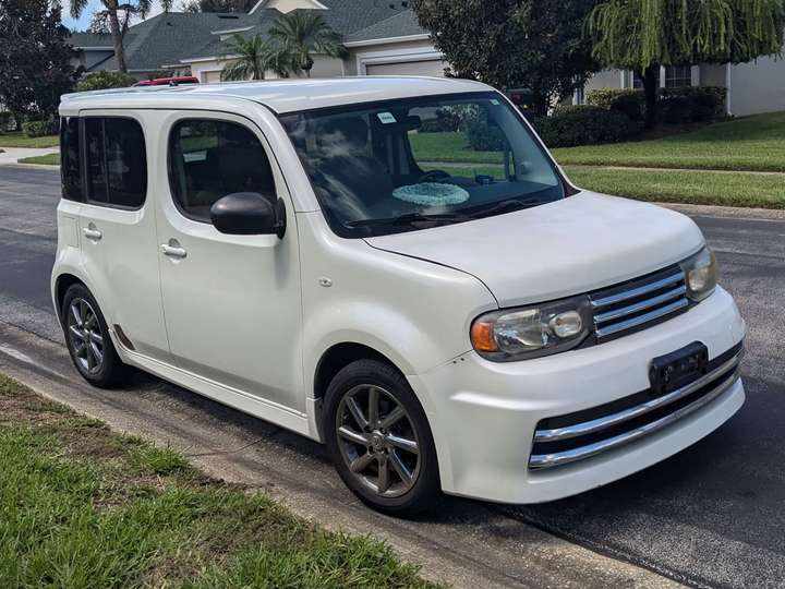 A white rounded rectangular hatchback