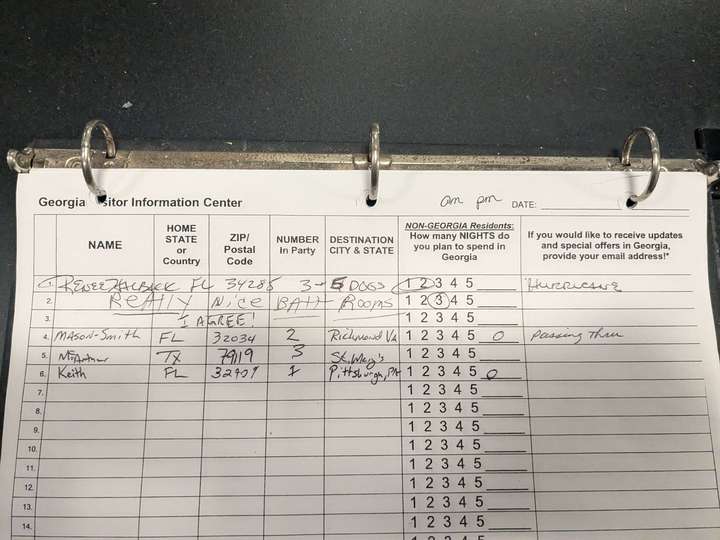 a logbook at a state welcome center