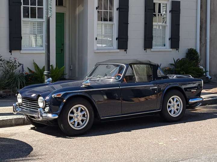 a street parked traditionally styled British roadster