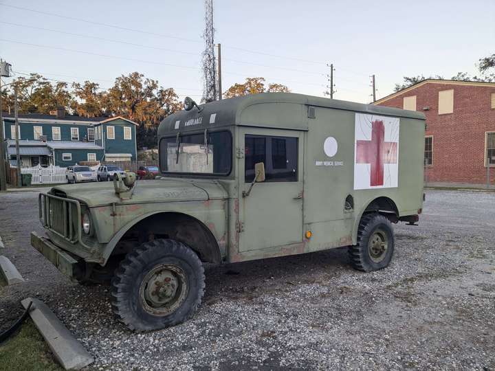 A weathered 1960s military ambulance