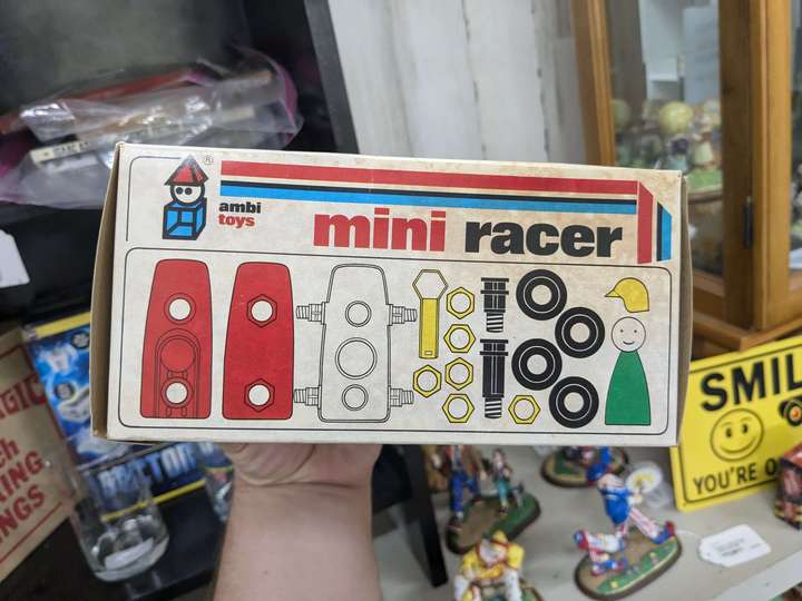 the box for a build-it-yourself race car toy